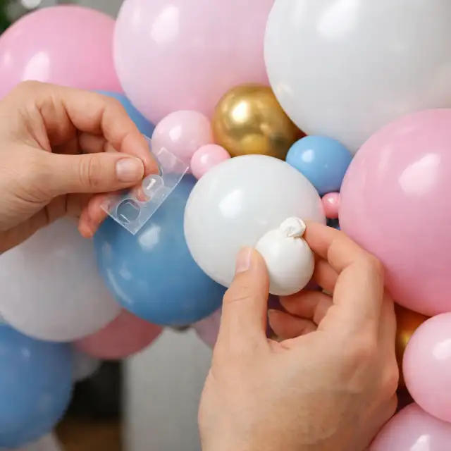 Filling gaps in balloon arch with small 5-inch balloons