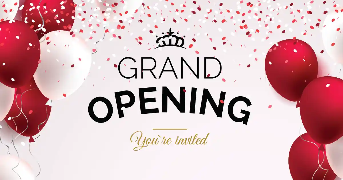 Funsational balloon arch and decorations for a retail store grand opening celebration