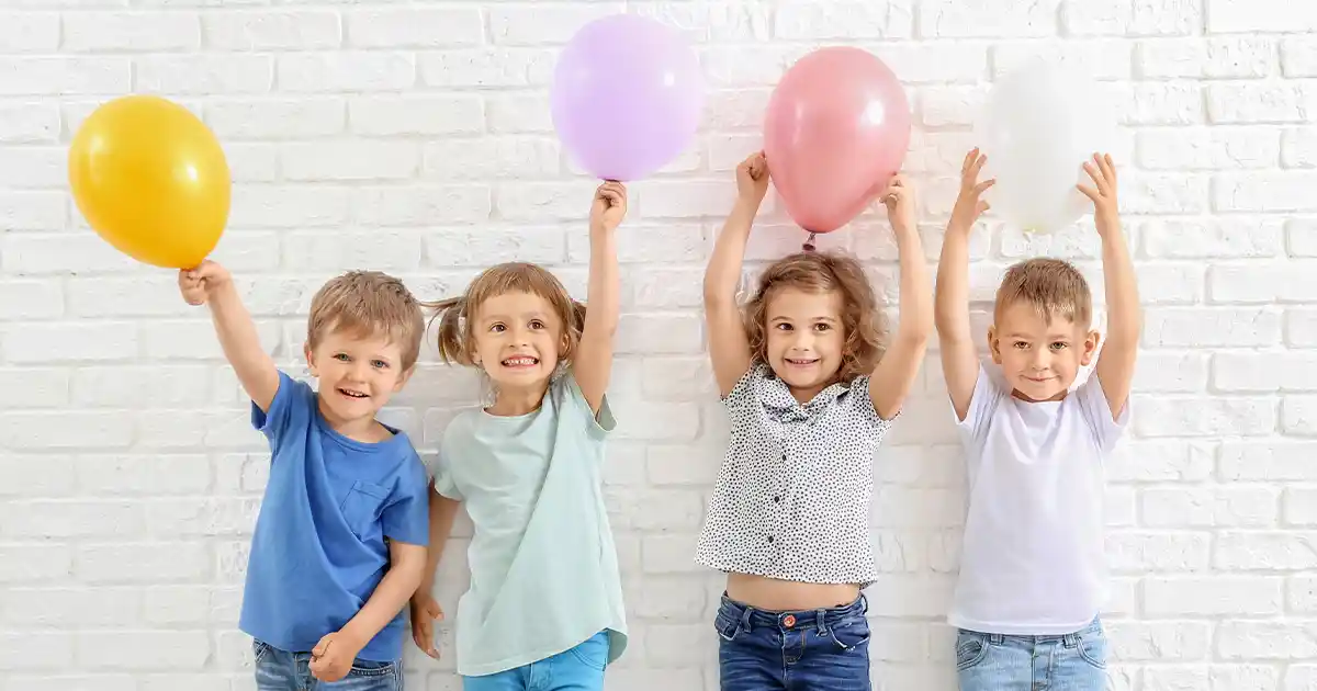 Fun and colorful Funsational balloon decorations at a children's birthday party