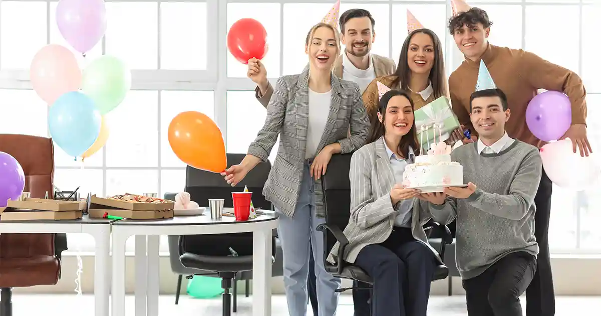 Professional Prima balloon display with branded colors at a corporate event or grand opening