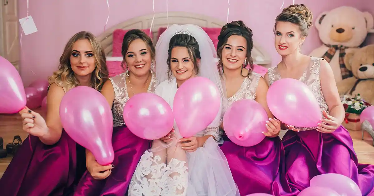 Sophisticated Qualatex balloon arch in white, ivory and Chrome gold for a wedding ceremony
