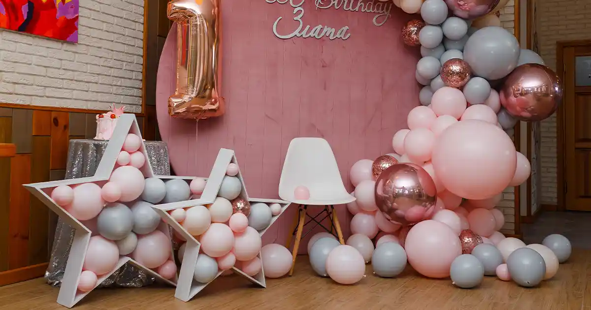 Colorful Sempertex balloon wall backdrop for professional event photography